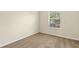 Bedroom featuring neutral walls, carpeting, and a large window at 12449 Cruxbury Dr, Windermere, FL 34786
