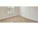 Well-lit bedroom with tan carpet and natural light from the window at 12449 Cruxbury Dr, Windermere, FL 34786