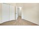Bedroom features neutral walls, plush carpeting and multiple doors at 12449 Cruxbury Dr, Windermere, FL 34786