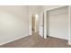 Neutral bedroom with an open closet and doorway to the en-suite bathroom at 12449 Cruxbury Dr, Windermere, FL 34786