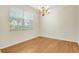 Well-lit dining area with new flooring and a chandelier at 12449 Cruxbury Dr, Windermere, FL 34786