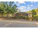 Picturesque community entrance sign surrounded by lush landscaping at 12449 Cruxbury Dr, Windermere, FL 34786