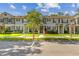 Charming townhomes feature well-maintained landscaping and inviting curb appeal in a desirable neighborhood at 12449 Cruxbury Dr, Windermere, FL 34786