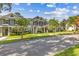 Inviting townhome community showcases meticulous landscaping and well-manicured greenery at 12449 Cruxbury Dr, Windermere, FL 34786
