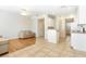 Open-concept living area features tile floors and a cozy seating area with modern furnishings at 12449 Cruxbury Dr, Windermere, FL 34786