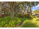 Scenic view of a pond with a fountain and charming gazebo at 12449 Cruxbury Dr, Windermere, FL 34786