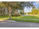 Scenic view of a pond with a fountain and charming gazebo at 12449 Cruxbury Dr, Windermere, FL 34786
