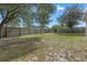 Expansive backyard with lush green grass and privacy fence at 144 Fort Smith Blvd, Deltona, FL 32738