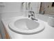 Close-up of the bathroom sink with modern fixtures and neutral decor at 144 Fort Smith Blvd, Deltona, FL 32738