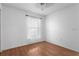 Bright bedroom with wood floors and natural light at 144 Fort Smith Blvd, Deltona, FL 32738