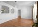 Bright living room with stylish wood floors and an open layout at 144 Fort Smith Blvd, Deltona, FL 32738