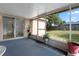 Relaxing screened-in patio with views of the backyard at 144 Fort Smith Blvd, Deltona, FL 32738