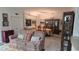 A living room featuring a comfortable sofa, and stylish decor, creating an inviting living space at 148 Peregrine Ct, Winter Springs, FL 32708