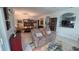 An open-concept living room featuring comfortable seating and stylish decor, perfect for relaxation and entertaining at 148 Peregrine Ct, Winter Springs, FL 32708