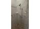 Shower with a tile surround and mosaic tile floor at 148 Peregrine Ct, Winter Springs, FL 32708