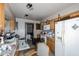 Functional kitchen area with white appliances and ample counter space at 1511 Center Ave, Holly Hill, FL 32117