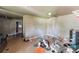 Large living room with tile flooring and basic furnishings at 1511 Center Ave, Holly Hill, FL 32117