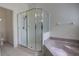 Bathroom showcasing a large glass shower and soaking tub at 1679 Shadowmoss Cir, Lake Mary, FL 32746