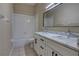 Bathroom featuring double sinks, a large mirror, and a shower and bathtub combination at 1679 Shadowmoss Cir, Lake Mary, FL 32746