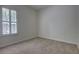 This bedroom features neutral carpet and paint, bright windows, and ample natural light at 1679 Shadowmoss Cir, Lake Mary, FL 32746