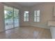 Kitchen nook includes sliding glass door and plantation shutters providing ample natural light at 1679 Shadowmoss Cir, Lake Mary, FL 32746
