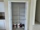 Walk-in pantry with shelving and storage space for food items and supplies at 2149 Mallard Creek Cir, Kissimmee, FL 34743