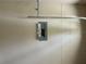 A close-up image of a utility wall showing breaker box and piping at 2149 Mallard Creek Cir, Kissimmee, FL 34743