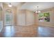 Spacious living area featuring tile floors and an abundance of natural light at 216 Homestretch Blvd, Deland, FL 32724