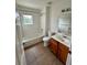 Clean bathroom with a tub, shower, and vanity, offering a functional space at 2200 San Vittorino Cir # 102, Kissimmee, FL 34741