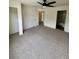 Spacious bedroom with neutral carpet and large closet at 2200 San Vittorino Cir # 102, Kissimmee, FL 34741