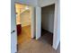 View through the hallway to the bathroom and closet space at 2200 San Vittorino Cir # 102, Kissimmee, FL 34741