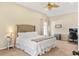 Bedroom featuring neutral carpet, ceiling fan and room for a computer at 253 Clydesdale Cir, Sanford, FL 32773