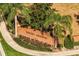 Baker's Crossing brick community sign surrounded by lush greenery at 253 Clydesdale Cir, Sanford, FL 32773