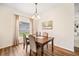 Cozy dining room with hardwood floors and a view to the backyard at 253 Clydesdale Cir, Sanford, FL 32773