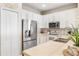 This kitchen offers stainless steel appliances and bright white cabinetry at 253 Clydesdale Cir, Sanford, FL 32773