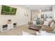 Comfortable living room with a large sectional couch and neutral tones at 253 Clydesdale Cir, Sanford, FL 32773