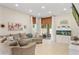 Cozy living room with a large sliding glass door that provides outdoor access at 253 Clydesdale Cir, Sanford, FL 32773