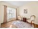 Bright and airy living room with hardwood floors and neutral tones at 253 Clydesdale Cir, Sanford, FL 32773