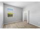 Bedroom featuring neutral carpet and closet with shelving at 2781 Sand Oak Loop, Apopka, FL 32712
