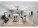 Bright living room with recessed lights, neutral walls, and a ceiling fan at 2781 Sand Oak Loop, Apopka, FL 32712