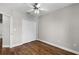 Neutral bedroom offers hardwood floors, a double-door closet, and ample natural light at 4244 Messina Dr, Lake Mary, FL 32746
