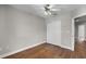 Bedroom with hardwood floors and a double door closet that is spacious and functional at 4244 Messina Dr, Lake Mary, FL 32746