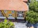 Aerial view of the townhome, with tile roof, garages, and green landscaping at 4244 Messina Dr, Lake Mary, FL 32746