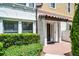 Inviting front entrance with brick pavers, well-maintained landscaping, and covered entryway for a welcoming first impression at 4244 Messina Dr, Lake Mary, FL 32746