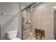 Walk-in Shower with a glass door and a built-in seat at 4244 Messina Dr, Lake Mary, FL 32746