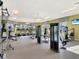 The on-site gym is modern and spacious, equipped with treadmills, weights, and machines at 4973 Windermere Ave, Kissimmee, FL 34746