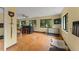 Large bonus room featuring a bar, three windows, and space for a tv and seating at 5237 Gateway Ave, Orlando, FL 32821