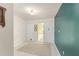 Welcoming foyer with tiled floor and neutral-toned walls, accented by decorative lighting fixtures at 5237 Gateway Ave, Orlando, FL 32821