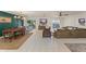 Spacious living room with tile flooring, complemented by sliding glass doors leading to outdoor space at 5237 Gateway Ave, Orlando, FL 32821