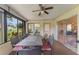 Enclosed outdoor space with furniture and access to the yard at 5237 Gateway Ave, Orlando, FL 32821